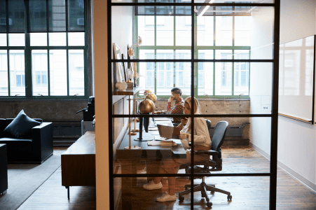 A photo of a beautiful glass divider in an office
